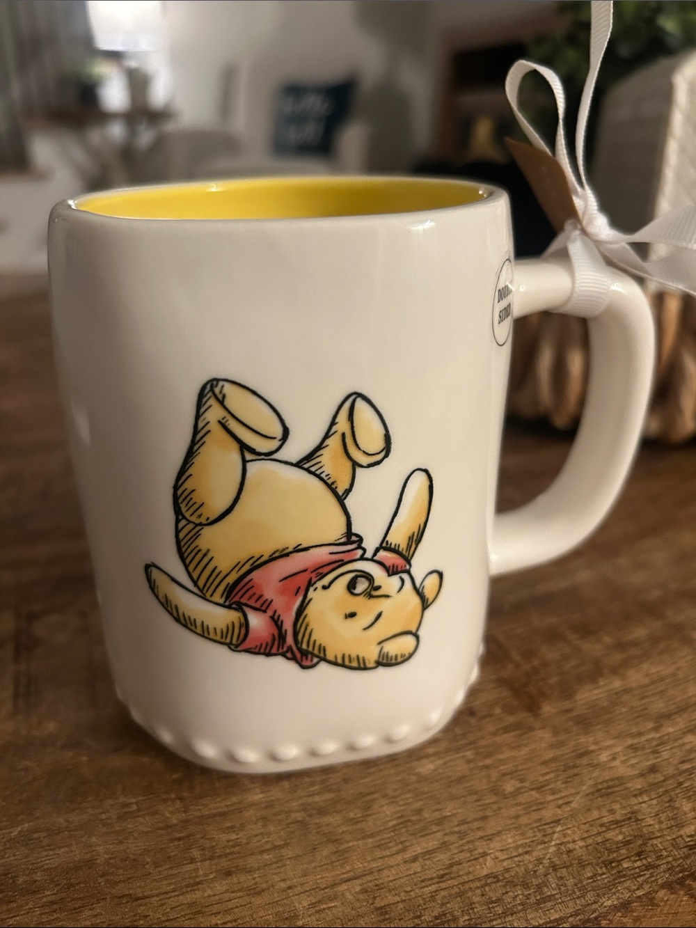 Rae Dunn Ceramic Winnie the Pooh Mug front and back design with Yellow Interior